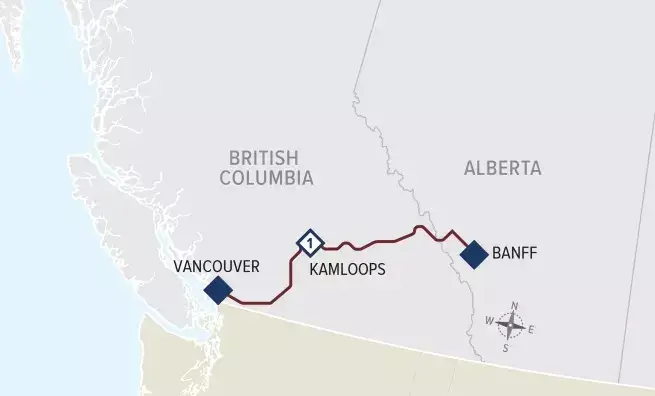 Map showing the route from Vancouver to Banff, passing through Kamloops, in British Columbia and Alberta, Canada. The map highlights key locations along the journey and includes a compass rose for orientation.